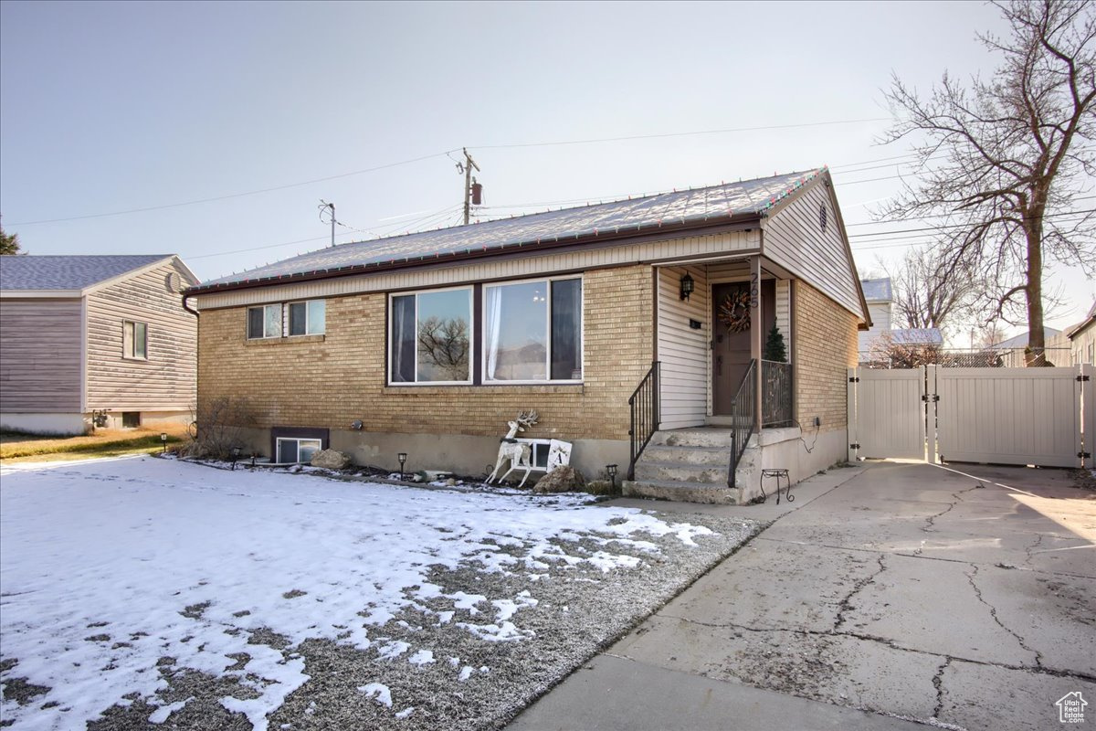 This is the perfect starter home! Some updates include: newer roof and a/c, newer windows, including basement egress window to accompany a newly finished basement, a 200 amp electrical panel, and a fully powered 18x12 shed. This home is located on a quiet street close to shopping and all the great things northern Utah has to offer. It also features 3 bedrooms, 2 bathroom, 2 living rooms, and a cute eat in kitchen. Call or text for more details.   Square footage figures are provided as a courtesy estimate only and were obtained from county records.  Buyer is advised to obtain an independent measurement.