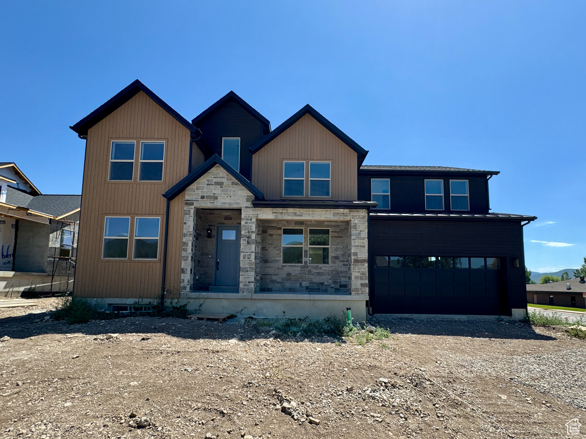 Quick move-in with estimated completion in two weeks! Final touches being completed now. The amazing Zurich floor plan offers a bright and airy great room with walls of windows and a beautiful fireplace. The gourmet kitchen offers a double oven, chic two tone cabinets, and a butler's pantry. The main floor also boasts formal and informal dining spaces and a private office with French doors. Master suite along with 3 other bedrooms and the laundry are on the upper level. See the floor plan in the photos for more details.. Located in the heart of Midway and tucked just south of Main Street where you can enjoy a quick walk to the local favorites as well as easy access to world class skiing, blue-ribbon fly fishing and some of the best golf courses in Utah. Call agent with questions.