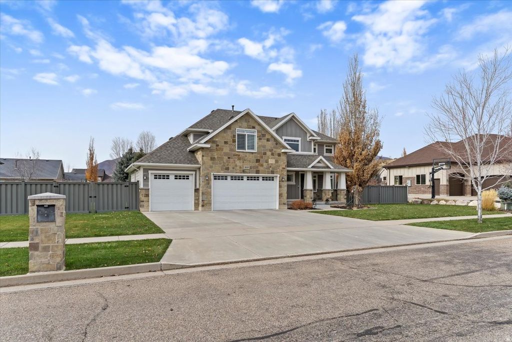 Photo of 6043 N LARIAT LN, Mountain Green, UT 84050 (MLS # 2122782)