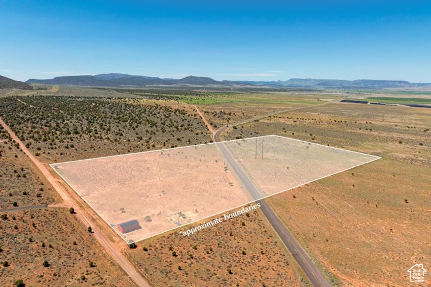 20 Acres for sale in Enterprise/Newcastle Utah. Only 12 minutes away from Newcastle Reservoir. Beautiful Mountain / Valley Views right at the foot of the mountains. See the stars at night. Build a home, cabin or bring your RV's, Camper's, Trailer for a family retreat property. Parcel split by county road but can be subdivided into 2 separate parcels if interested. Each parcel is roughly 10 acres. Both sides are fully fenced. East parcel has goat and sheep fencing and 3 pastures. Close to the city of Enterprise for conveniences such as grocery, gas, hardware, medical, dental, restaurants. Enterprise Reservoir is nearby also. Plenty of trails for hiking and offroading with ATV's and UTV's. Currently assessed in Green Belt tax rate (low taxes).