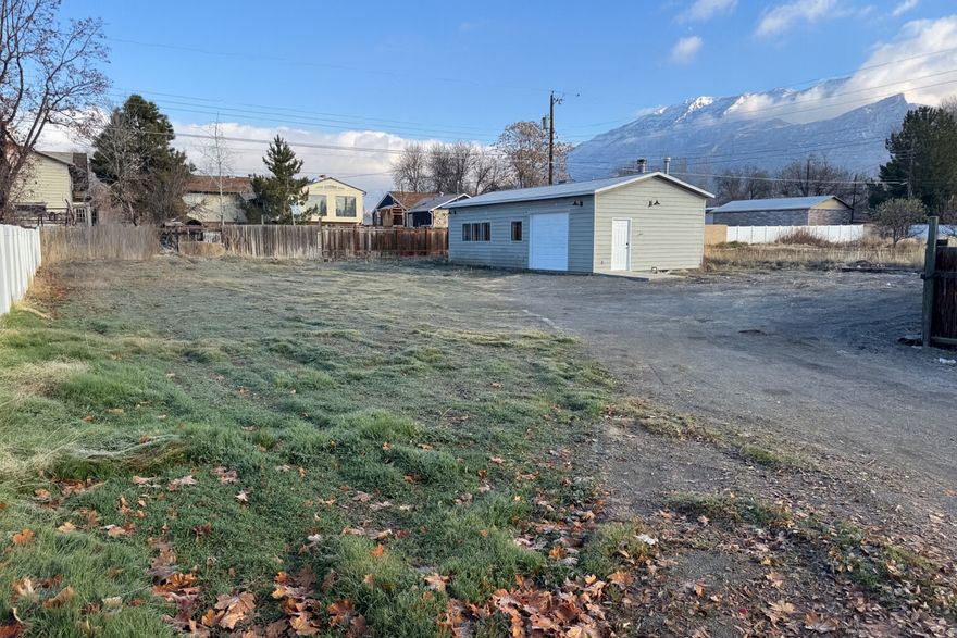 Beautiful lot with amazing mountain views. Located on a quiet CUL-DE-SAC. 800 SQFT workshop with electricity connected. Lots of possibilities with the existing shop. Perfectly situated near BYU, UVU, and Utah Valley Regional Medical Center, this prime location offers convenience and accessibility. Power connected, water, sewer, gas not currently connected. *** OWNER AGENT ***