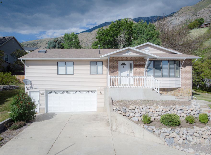 Hidden Gem Above Timpview High School in Provo! This rare 4-bedroom, 3-bath home offers breathtaking mountain and valley views in one of Provo's most sought-after neighborhoods. Enjoy a spacious layout, natural light throughout. The brand-new basement apartment is beautifully finished and provides an incredible opportunity for rental income to help offset your mortgage.