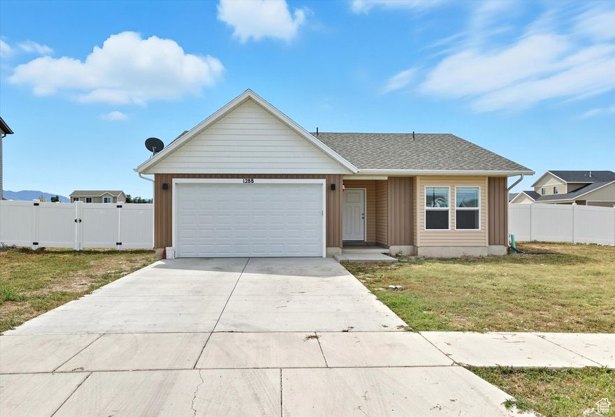 Welcome to this well-cared-for Nibley home featuring an open layout, a spacious kitchen, and a comfortable primary suite. Enjoy the ease of one-level living with thoughtful spaces designed for comfort and convenience. The fenced backyard provides plenty of room to relax, garden, or entertain, and extra RV parking gives you space for toys, trailers, or extra vehicles. Located in a quiet community with easy access to schools, parks, shopping, and Logan amenities, this home is both practical and inviting - and it's priced to sell!