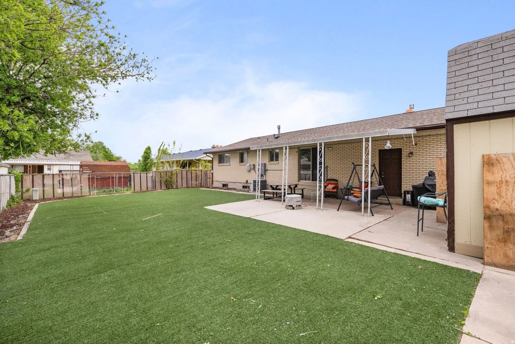 Photo of 2234 W ARCHES DR, Taylorsville, UT 84129 (MLS # 2153900)