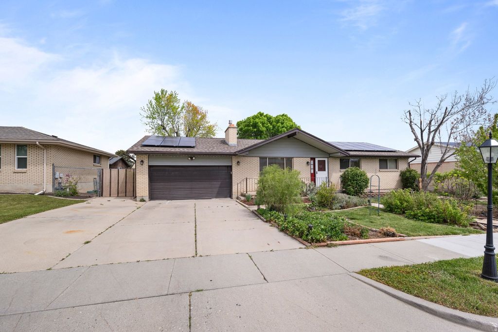 Photo of 2234 W ARCHES DR, Taylorsville, UT 84129 (MLS # 2153900)