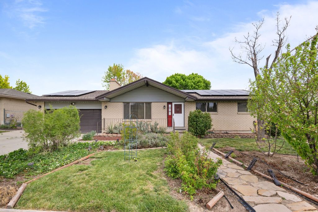 Photo of 2234 W ARCHES DR, Taylorsville, UT 84129 (MLS # 2153900)