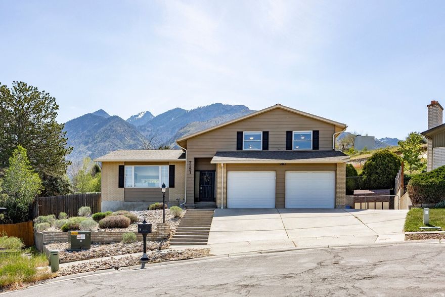 Perched at the top of a quiet cul-de-sac, this Cottonwood Heights tri-level offers privacy, views, and an ideal layout for both everyday living and entertaining. A beautifully remodeled kitchen opens the floor plan, creating seamless flow between the living spaces while capturing stunning valley and mountain vistas from the kitchen, living room, and upstairs bedrooms.  Set on an expansive pie-shaped corner lot, the outdoor space is just as impressive-featuring a spacious deck, covered patio, fenced yard, and convenient RV parking. With no neighbors behind, enjoy added privacy along with the sounds of summer evenings and neighborhood baseball from nearby Bywater Park.  Upstairs, the primary suite includes a private en suite bath, while two north-facing bedrooms showcase unobstructed valley views. Walk to the park's new tennis courts, playground, and open green space, and enjoy proximity to the Cottonwood Heights Recreation Center with its indoor and outdoor pools.  Ideally located near Big Cottonwood Canyon and Ferguson Canyon, you'll have quick access to year-round recreation while avoiding canyon traffic. Commuting is effortless with excellent access to Interstate 215 just minutes away, making this location as convenient as it is scenic.