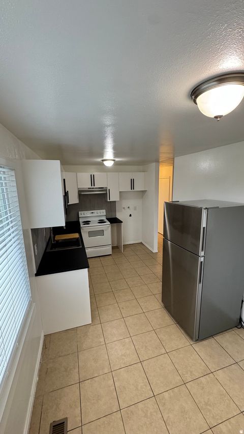 Tiny photo for 2530 S PARKCREST DR, West Valley City, UT 84119 (MLS # 2132014)