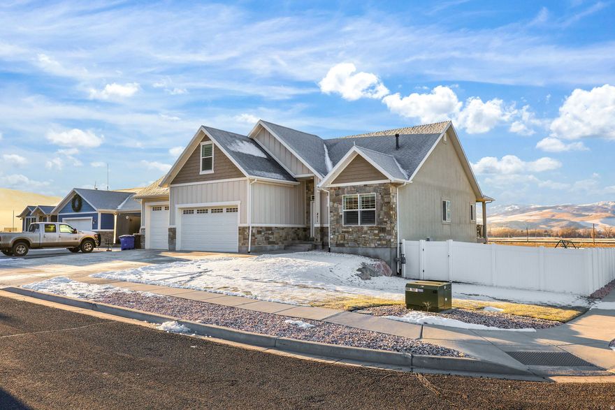 Super nice, super clean, and fully finished rambler with a bonus room, offering comfort, space, and stunning views. The fully finished walk-out basement includes three bedrooms and a spacious family room-perfect for entertaining or multi-generational living. Enjoy main-level living with a private master suite featuring his-and-hers closets. The upgraded kitchen shines with quality finishes and flows seamlessly to the covered deck, ideal for relaxing and taking in the amazing views. Loaded with upgrades and truly move-in ready. Conveniently located near the freeway entrance, offering peaceful country living just a short drive to Layton, Ogden, and Hill Air Force Base. This home has it all-come and see!