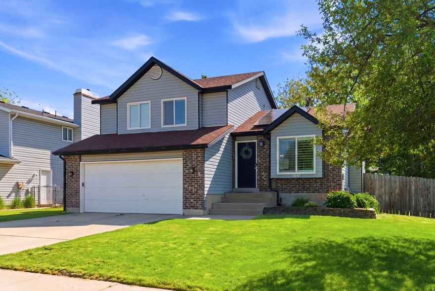 OFFERS DUE MONDAY MAY 18TH by 1:00 PM. Updated 4-bedroom, 3-bath home in the heart of Kaysville with quick access to shopping, dining, parks, and commuter routes. Kitchen fully remodeled in 2020 with updated finishes and new LVP flooring throughout main living areas. Primary suite features an updated bathroom, remodeled bedroom, and large walk-in closet. Spacious layout includes 2-car garage and functional storage throughout. Exterior deck replaced in 2020, creating additional outdoor living space. Paid-off solar panels help reduce utility costs, and a new water heater was installed this year.