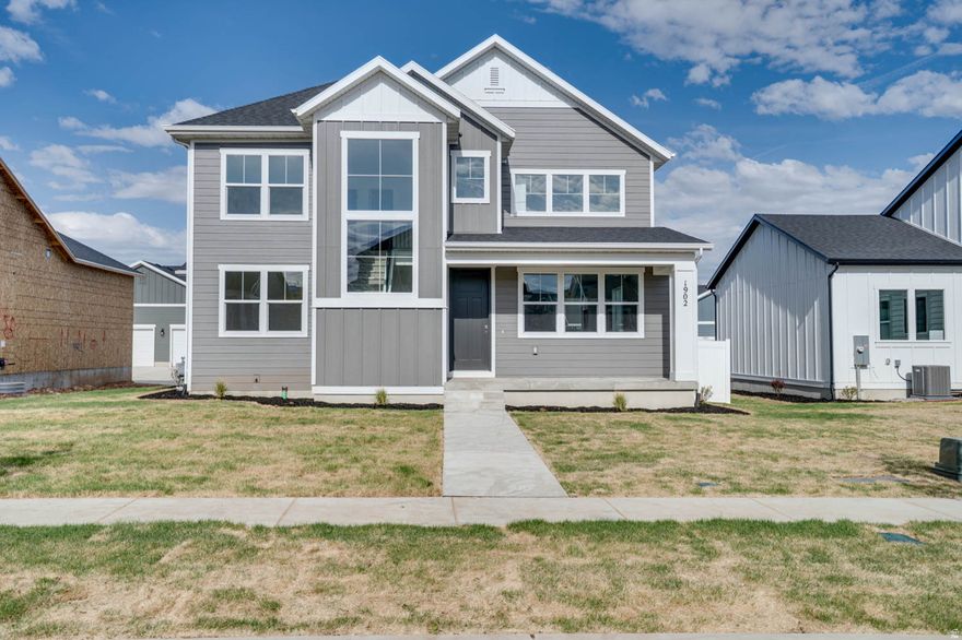 This stunning home was just completed and ready for move-in! Now is your opportunity to take advantage of our sales event! Builder is offering $26,700 when using our preferred lender! The Cliffrose is a gorgeous 2-story home that effortlessly blends elegance with modern functionality. A covered front porch welcomes you inside, where a grand two-story entryway sets the tone for the light-filled, open-concept design. The main living area flows seamlessly, offering 9' ceilings, a spacious great room, a well-appointed kitchen, and an inviting dining space ideal for both intimate gatherings and lively entertaining. For those seeking a quiet retreat, the private office provides the perfect space for work or study. Upstairs, the expansive primary suite offers a luxurious sanctuary, featuring a generous walk-in closet and a beautifully designed ensuite bath. Additional bedrooms provide ample space for family and guests, while the unfinished lower level presents endless possibilities; whether for future expansion, a recreation room, or extra storage. With its graceful design, thoughtful details, and room to grow, this timeless home adapts effortlessly to your lifestyle. This home is complete with full landscaping and a fenced backyard. Buyer to verify all. Square footage figures are provided as a courtesy estimate only and were obtained from building plans.