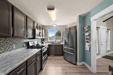 Tiny photo for 3140 S GEORGE PL, Magna, UT 84044 (MLS # 2113371)