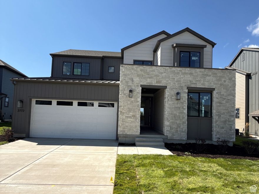 TRIPOINTE QUICK MOVE IN HOME ON LOT 208! Take in breathtaking views of Mt. Timpanogos from your new home in the serene community of The Crossing at Lake Creek. Whether you're enjoying quiet moments on the covered patio, relaxing in the expansive great room, or retreating to the elegant primary suite, nature's beauty is always in view. The chef-inspired kitchen-with its oversized island-is perfect for entertaining, while designer-curated finishes from an award-winning team add a touch of sophistication throughout. This well-designed home features four spacious bedrooms, three stylish bathrooms, a versatile bonus room, convenient upstairs laundry, and an unfinished basement offering endless possibilities for customization. Square footage figures are provided as a courtesy estimate only and were obtained from Builder. Buyer is advised to obtain an independent measurement.