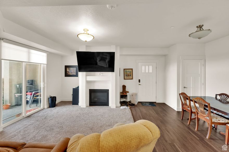 Centrally located in the heart of Heber Valley, this main-level Ranch Landing condo offers both comfort and convenience. This 3 bedroom 2 bath features an ideal functional layout, ten-foot ceilings, & large windows that fill the home with natural light, creating an inviting and open atmosphere. Step outside to the excellent patio, a perfect outdoor retreat that provides shade in the evenings. Enjoy all the amenities Ranch Landing has to offer, including a pool, clubhouse with fitness room, pickleball courts, playground, and picnic/BBQ areas. Whether you're looking for a primary residence, second home, or investment property, this condo is an ideal fit. Located just minutes from world-class skiing, golf, boating, hiking, and biking, and with easy access to Park City, Provo, and Salt Lake International Airport, this home puts the best of Utah living right at your doorstep. Easy to show and ready to welcome its next owner!