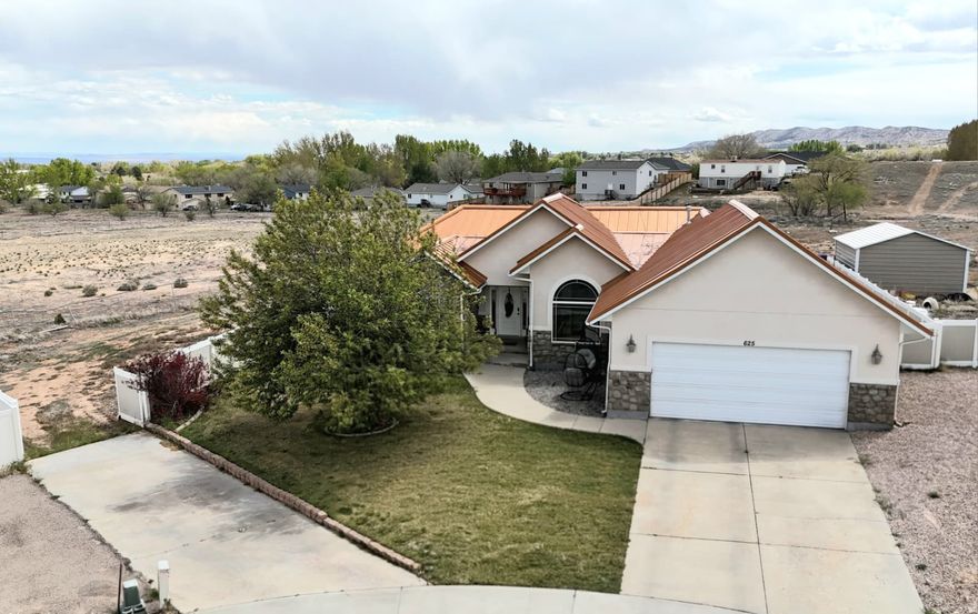 Updated 3 bed, 2 bath rambler on a 0.53 acre cul-de-sac lot in Hillside Haven with an open floor plan and granite countertops carried throughout the home for a clean, cohesive look. The eye-catching penny copper metal roof is both a standout design feature and a durable upgrade the seller has already invested in. Main-floor living includes a comfortable primary suite, two additional bedrooms, a study/office, and convenient laundry, with a full unfinished basement ready for future bedrooms, a large family room, or storage. Outside, you'll appreciate the attached 2-car garage, extra-width parking, and additional ground beyond the fenced backyard-ideal for RVs, toys, gardening, or a future shop while still giving you room to breathe.  Square footage figures are provided as a courtesy estimate only and were obtained from county records.  Buyer is advised to obtain an independent measurement.