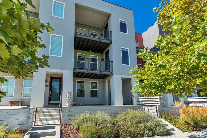 Beautifully upgraded townhome in the heart of Daybreak! This home was thoughtfully designed with premium finishes throughout including a gourmet kitchen, custom lighting, and stylish details that make it truly stand out. This floorplan features two spacious primary suites plus the option to finish a third suite on the main level. Relax outdoors with a large covered porch and two balconies that showcase breathtaking views. Nearby amenities include parks, Oquirrh Lake, shopping, restaurants, Bee's ballpark, a movie theater, and all the other community perks that make Daybreak one of Utah's most desired neighborhoods.