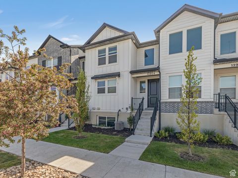 Photo of 13954 S CHAMPLIN PEAK DR, Herriman, UT 84096 (MLS # 2083153)