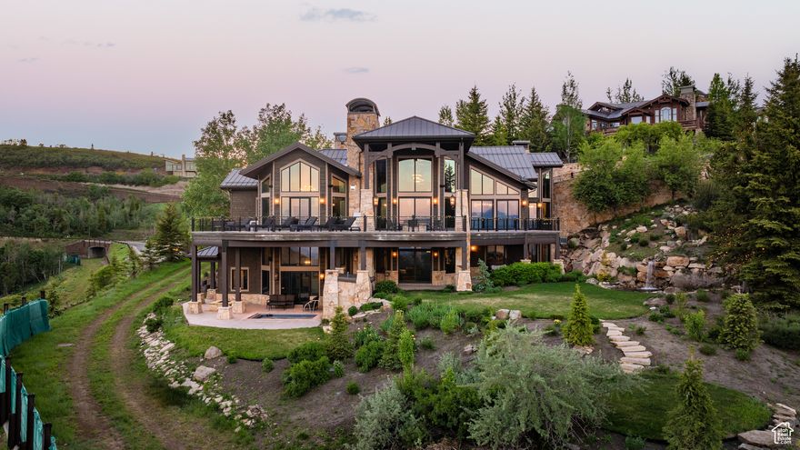 Welcome to the Sky Ridge Retreat, an exceptional ski estate located in the private community of Deer Crest within Deer Valley Resort. Recognized as one of the most sought-after locations in Park City, Deer Crest offers a level of privacy, exclusivity, and convenience that sets it apart from surrounding areas of the resort. With direct ski access to both Mountaineer and the Jordanelle Gondola, this home delivers an effortless connection to world-class skiing. Positioned on one of the premier lots in the community, the home captures sweeping lake and mountain views from nearly every room as it sits above the East Village new expansion. Expansive outdoor living areas further showcase the setting, designed for year-round enjoyment. Inside, the property is thoughtfully appointed with amenities for relaxation and entertainment, including a ski prep/game room, 50's-style movie theatre, billiards area, fitness room, business center, and more. Spanning generous square footage, this turn-key retreat is ideal for unforgettable family ski vacations, private entertaining, or as a corporate getaway.