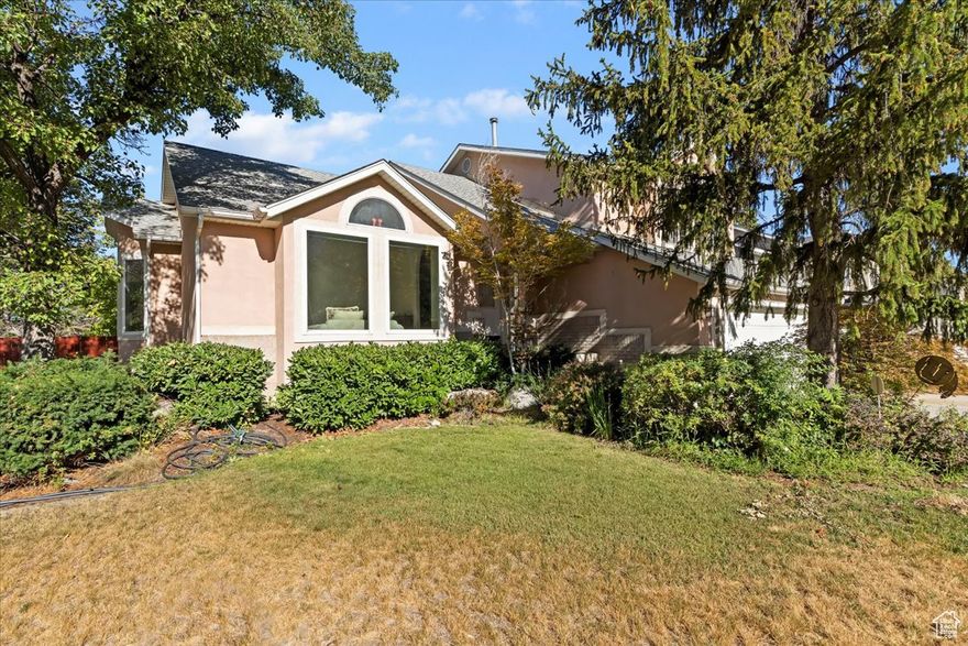 High-demand East Cottonwood Hts location. Neighboring homes priced over $1M. 3,491sf, 2-story, double ovens, oak flooring, large elevated deck off kitchen/dining. Fully fenced backyard, mature landscaping, & sprinkler system. Owners bedroom suite w/ sep tub & shower & walk-in closet. Roof & furnace recently replaced.  Separate entrance to BASEMENT APARTMENT with separate laundry, gas range, $1,800 rent income. Ideal DIY fix-up opportunity, priced accordingly.