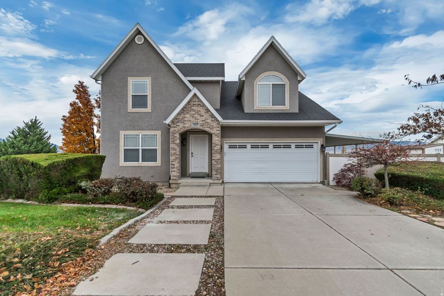 Rental income potential meets stunning views in coveted Virginia Ridge subdivision in American Fork. This homes basement features a second full kitchen with 1 bed/1 bath with a flex space to be a 2nd bedroom or extension for bigger family room and a walk out entrance. The spacious primary suite boasts double vanities, separate tub/shower, and walk-in closet. Wake up to breathtaking views of Utah Lake, mountains, and valley. Unbeatable location minutes from Jr. High, Costco, dining, shopping, entertainment, parks, and golfing. Home also has solar panels, seller will pay off the remaining loan amount. Built in storage in garage and storage shed. Square footage figures are provided as a courtesy estimate only and were obtained from county records. Buyer is advised to obtain an independent measurement.