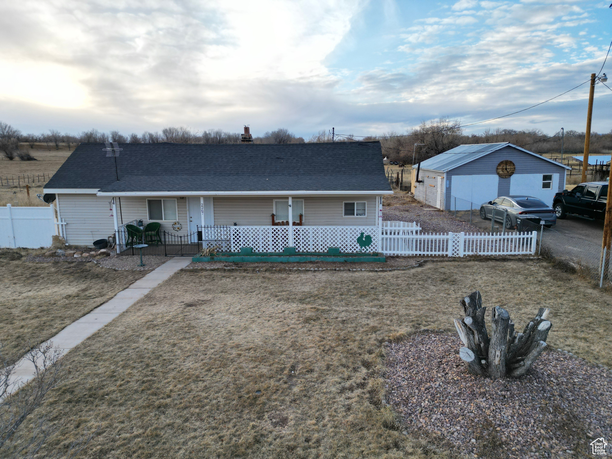 COUNTRY HOME WITH FARMHOUSE FEEL! This 3 bedroom 1 bath home rustically themed treasure features specially handcrafted barn doors, kitchen island in 1,182 SF. Many recent updates including kitchen, bathroom and LVP flooring. Wildlife galore, with views of the river and horse fields surrounding the .74 acre fully fenced lot. Garage has 2 -30 amp plugs on outside & 220v. plug inside. Square footage figures are provided as a courtesy estimate only and were obtained from county records. Buyer is advised to obtain an independent measurement.