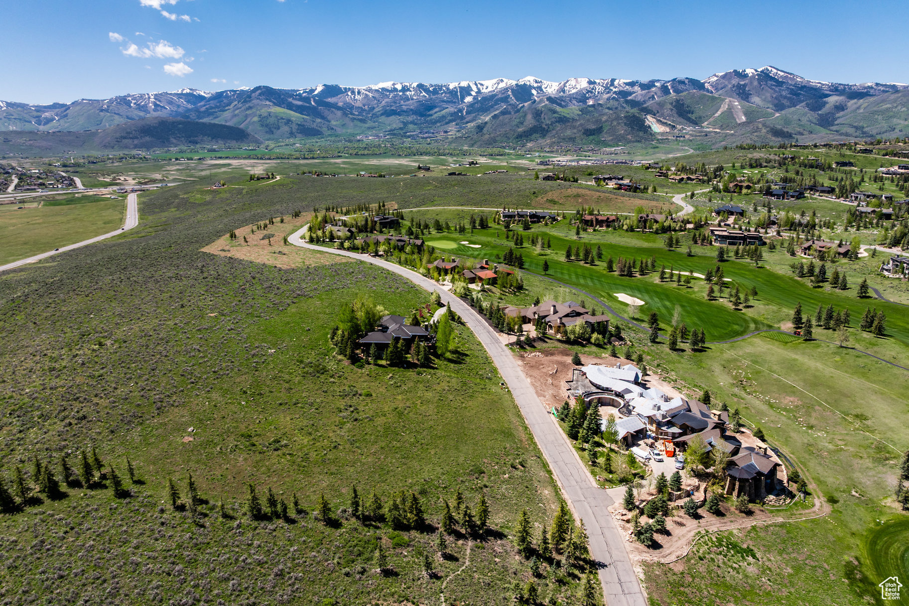Nestled in the heart of Utah's sought-after Park City, this spacious 2+ acre vacant land offers a rare opportunity to build your dream home in the prestigious Glenwild community. Known for its exceptional location, unmatched views, and close-knit neighborhood, this piece of paradise combines the best of both worlds: serene mountain living with easy access to Park City's world-renowned amenities. Glenwild is home to Utah's #1 rated golf course, as recognized by Golf Digest Magazine, providing you with an unparalleled lifestyle for golf lovers. This property boasts some of the best views in Glenwild-stunning vistas of the majestic Uinta Mountain Range, the pristine ski resorts, and the beautiful fairways of the golf course. Situated adjacent to open space on the east, you'll enjoy unobstructed views and privacy, while the quiet and peaceful environment ensures a tranquil retreat. As one of the smallest gated golf communities in Park City, Glenwild features fewer than 200 homes, creating a friendly, community-oriented atmosphere. Over 70% of residents are full-time or primary homeowners, enhancing the neighborhood's stability and sense of connection. The wide variety of architectural styles in the community ensures that your dream home will fit beautifully with the surrounding area. Located within the highly-rated Park City School District and just 30 minutes from the SLC Airport, you'll be perfectly positioned to enjoy both the outdoor and cultural aspects of life. Whether it's skiing, shopping, dining, or catching a movie, everything is just minutes away. For your convenience, Whole Foods and other shopping destinations are nearby. Glenwild offers an impressive array of amenities, including golf, tennis, a year-round swimming pool, fitness center, bar, restaurant, Nordic ski trails, and miles of hiking/biking trails. Whether you're joining in on the community social events or simply enjoying the peace and quiet, this is the place to live the mountain lifestyle!