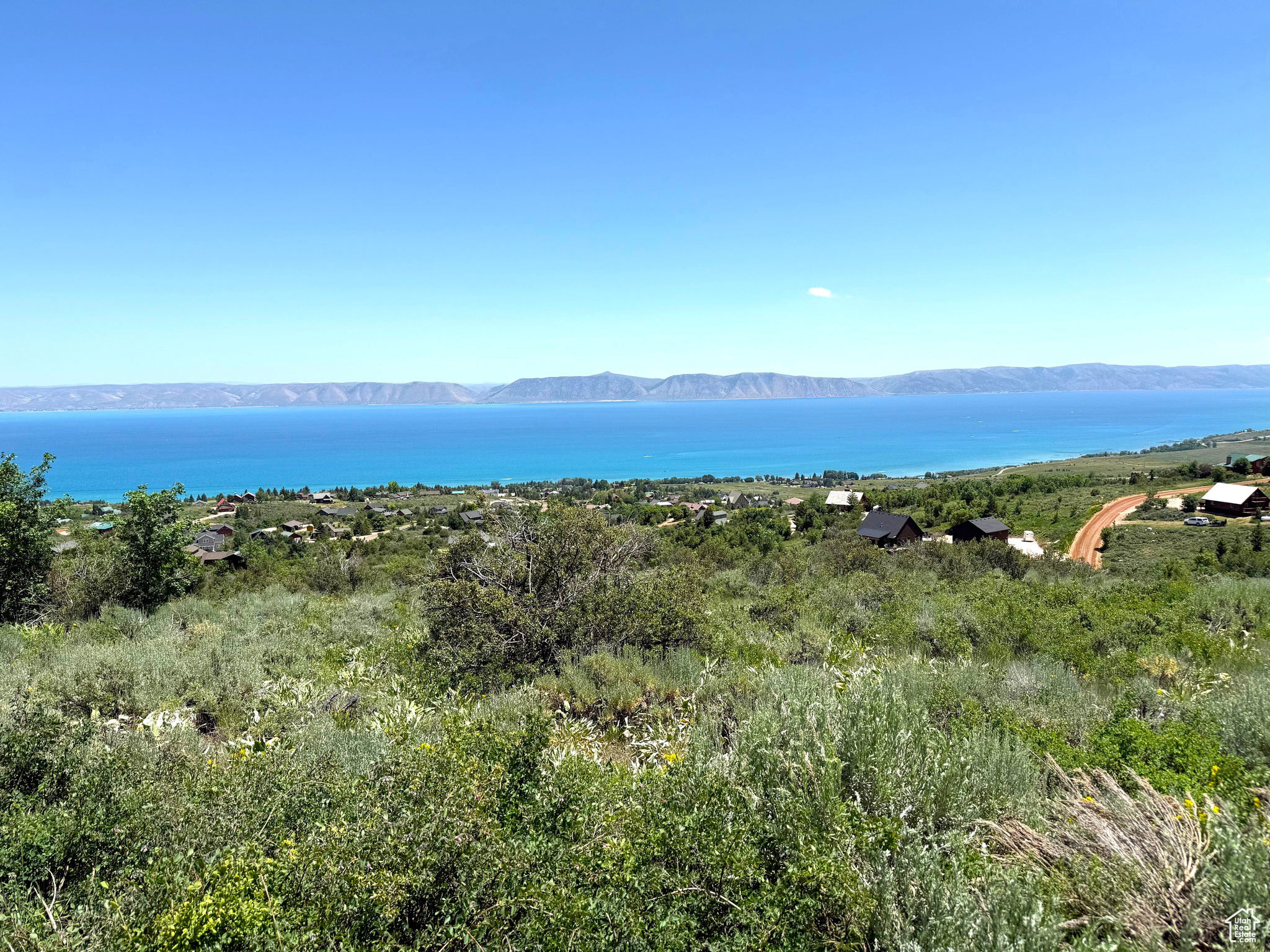 Beautiful building lot in the top of Bear Lake West! Gradual downhill slope with unrestricted view of the lake! One of the larger lots in Bear Lake West! Year round accessible. HOA amenities: discounts on Golf, Beach access, swimming pools, tennis/pickleball courts.
