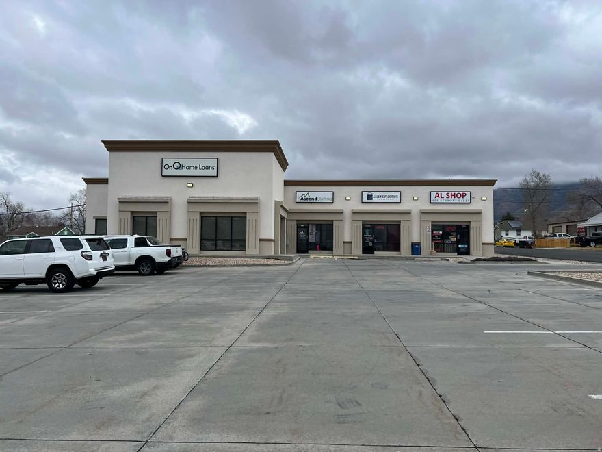 Available for lease: approximately 1,372 square feet of flexible commercial space in a prime Tooele location. Zoned Tooele City GC Commercial, this property sits on a highly visible, busy corner with convenient access to the freeway and major roads. The suite offers a spacious open main work area, plus one private office for added versatility. Tenants will benefit from the opportunity to feature their business on the complex's marquee sign, amplifying street-level exposure. Tenant improvements are negotiable, allowing for custom buildouts to fit your business needs. This is an excellent opportunity for businesses seeking a high-traffic location, flexible space, and outstanding accessibility in the heart of Tooele.