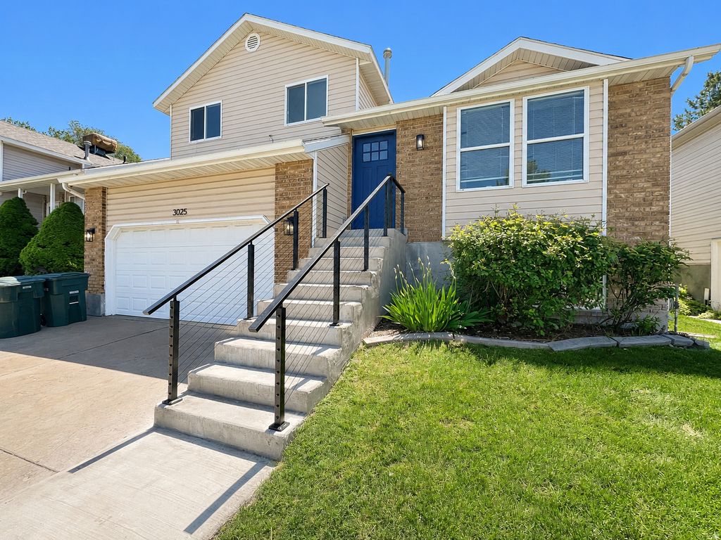Photo of 3025 W WESTCOVE DR, West Valley City, UT 84119 (MLS # 2157752)