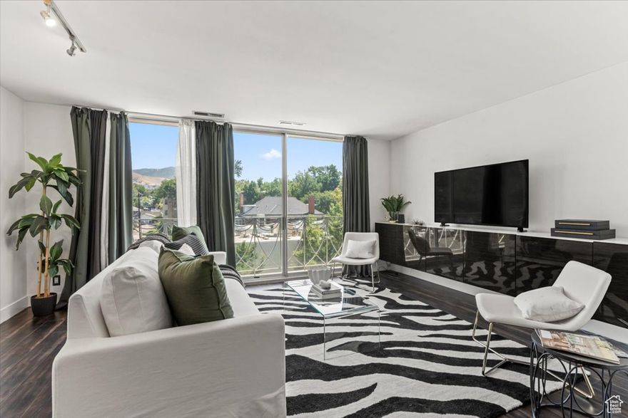 With east facing floor-to ceiling windows, double ovens, all new luxurious vinyl plank flooring, kitchen sink, paint, and stove top, this Historic Bonneville Tower home feels like a retreat in the center of the city. Walk to downtown or the University of Utah and take in the energy and vitality of the neighborhood. For those days when sanctuary calls, the 4th floor seclusion and security with a majestic view of the mountains will satisfy. This is Salt Lake City's first high-rise residential building and the historic charm lives today. Google Fiber is ready to be activated for work from home. Because units share walls, ceilings and floors, the unit is extremely efficient (owner pays an average of only $50/month for electricity. Water, sewer, gas, and insurance are included in HOA.)