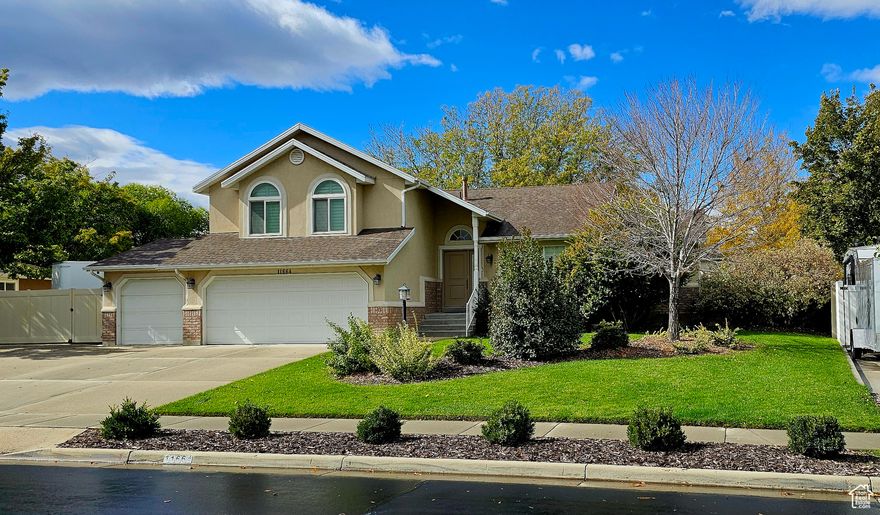 Beautiful fully updated home mountain views.Walking access to Jordan River Parkway 3-car garage,fenced RV parking. Huge landscaped yard, cvd patio, sport court, basalt fountain, storage shed, fenced play area.Updated irrigation/drip system. Buyer to verify  Square footage figures are provided as a courtesy estimate only and were obtained from Salt Lake County records.  Buyer is advised to obtain an independent measurement.