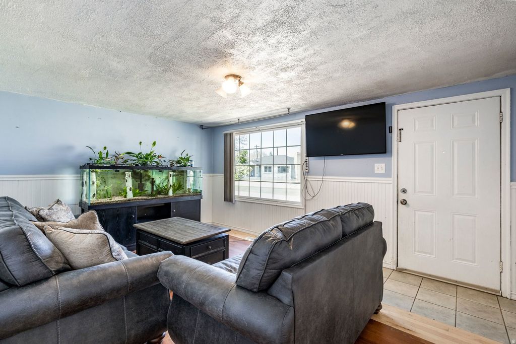 Photo of 307 S PARK ST W, Layton, UT 84041 (MLS # 2156325)