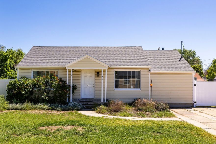 Super cute, light yellow house on corner lot. North facing, lots of natural light.  Within last 6 years, sellers have replaced the roof, upgraded the plumbing, upgraded the electrical, replaced the water heater, replaced the furnace, added an AC unit and installed a vinyl fence. Now, the finish work is up to you! With some effort, the hardwood floors, drywall repair, paint and carpet and it'll be like new.  Spacious backyard, patio, raised garden boxes and fruit trees. Lot is large enough to add garage and RV parking and still have room to enjoy mountain views. Walking distance to schools. Near Saltaire Farms Equestrian Center, Walmart, Layton Hospital and Layton Station.