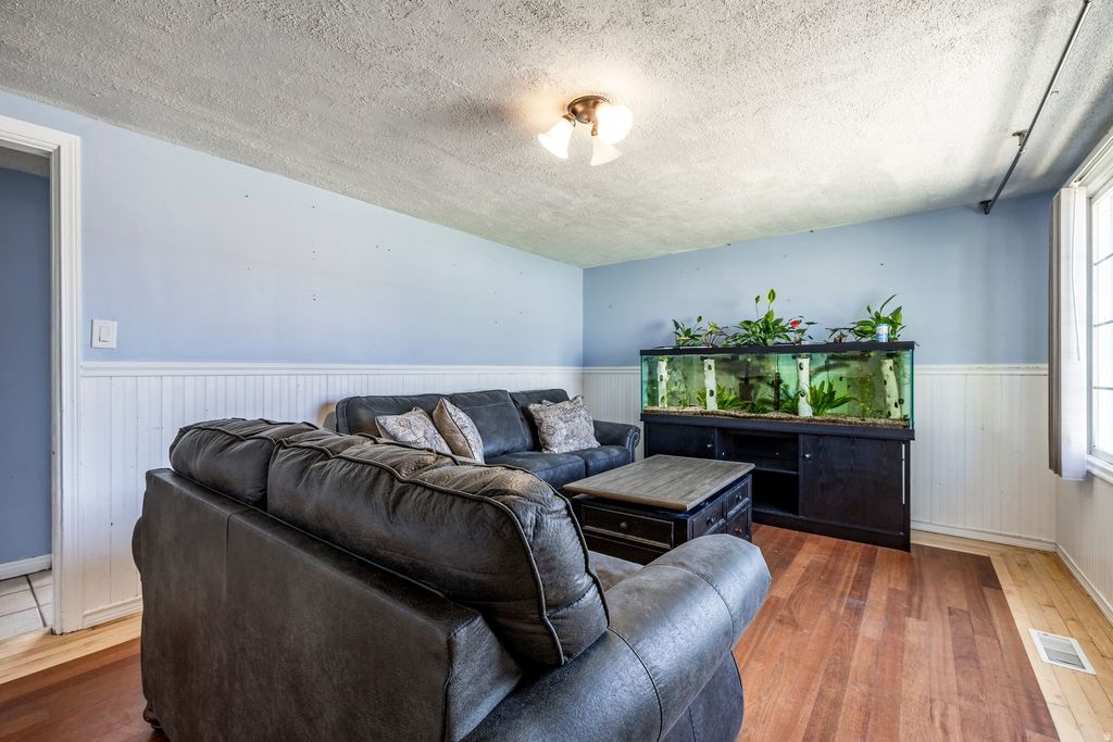 Photo of 307 S PARK ST W, Layton, UT 84041 (MLS # 2156325)