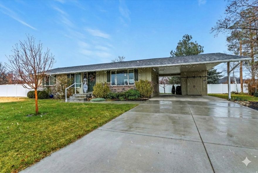 Welcome to this exceptionally cared-for home tucked in a quiet Orem neighborhood, just steps from Orem High School, all of Orem's fantastic shopping, and all the conveniences you could ask for. Pride of ownership is evident at every turn-this home has been meticulously maintained and beautifully cared for by owners who value quality and craftsmanship.  Enjoy stunning mountain views right from your own yard, complemented by a retractable awning that creates the perfect shaded retreat for outdoor living. Energy efficiency is already taken care of with fully paid-off solar, giving you long-term savings and peace of mind.  The spacious unfinished basement is a blank canvas-ready for the next owner to create the dream space they've always imagined. Rarely does a home combine location, condition, views, and potential so seamlessly. Come see why this one stands out.