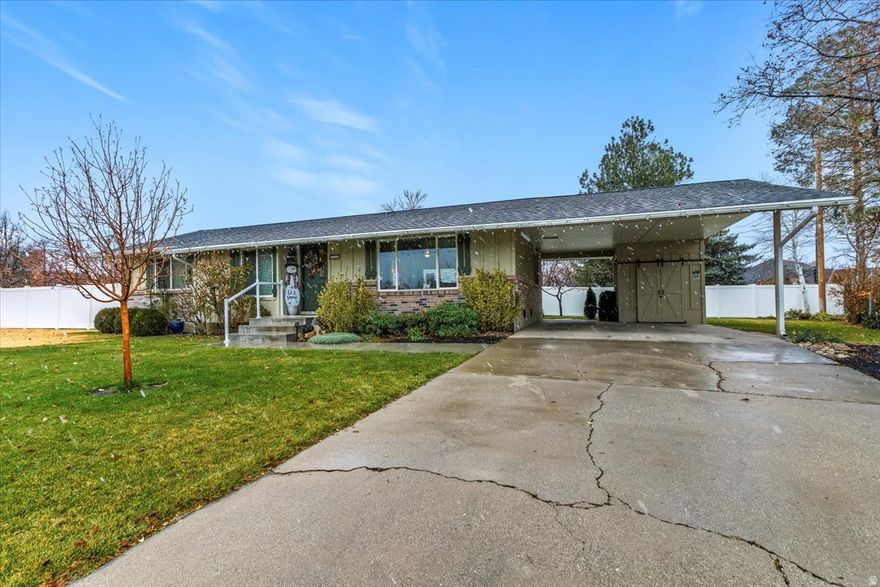 Welcome to this exceptionally cared-for home tucked in a quiet Orem neighborhood, just steps from Orem High School, all of Orem's fantastic shopping, and all the conveniences you could ask for. Pride of ownership is evident at every turn-this home has been meticulously maintained and beautifully cared for by owners who value quality and craftsmanship.  Enjoy stunning mountain views right from your own yard, complemented by a retractable awning that creates the perfect shaded retreat for outdoor living. Energy efficiency is already taken care of with fully paid-off solar, giving you long-term savings and peace of mind.  The spacious unfinished basement is a blank canvas-ready for the next owner to create the dream space they've always imagined. Rarely does a home combine location, condition, views, and potential so seamlessly. Come see why this one stands out.