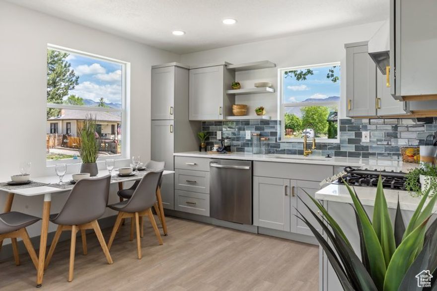 *PRICE IMPROVEMENT* Discover the perfect blend of classic charm and modern comfort in this beautifully renovated Sugar House bungalow. Situated on a quiet, tree-lined street, this 4-bedroom, 2-bath home has been updated from the studs out-new electrical, plumbing, HVAC, roof, siding, and more-offering true move-in-ready peace of mind.  The light-filled main level features a spacious living room with original hardwood floors, new cabinetry and countertops, and a seamless flow into the dining area. Downstairs, enjoy a fully finished basement with generous ceiling height, two additional bedrooms, a full bath, laundry, and storage.  Enjoy outdoor living with a large, and private backyard. Located just minutes from Liberty Park, Sugar House shopping, and downtown SLC, this home offers style, substance, and unbeatable location.  Current tenant is on a month to month lease.  Home owners are HIGHLY  motivated! Purchase price for seller finance is $679,000. Please contact listing agent for the remaining seller finance terms.