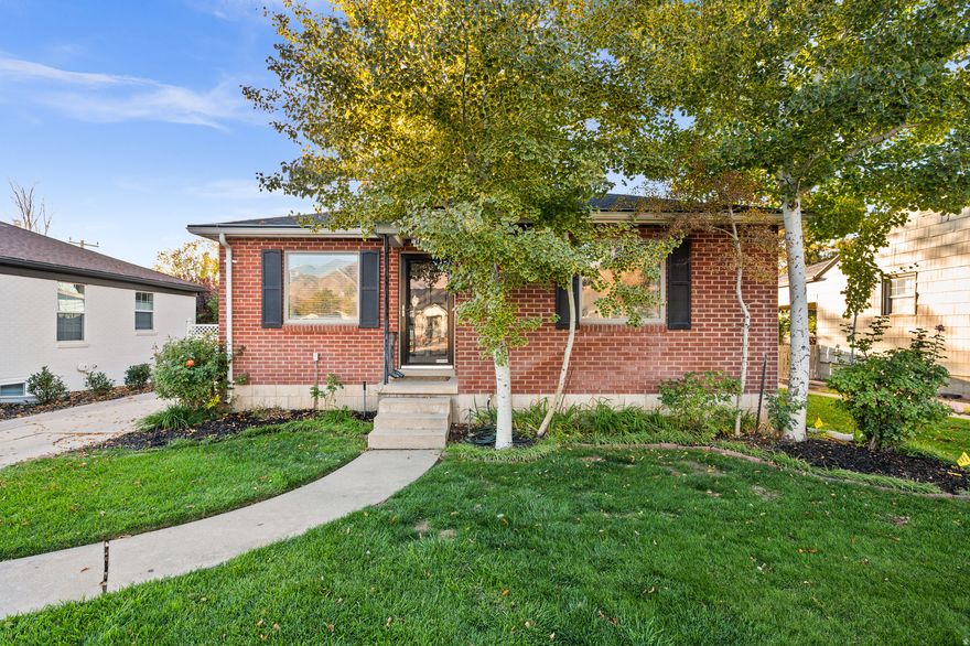 Welcome to this beautifully updated 4 bedroom, 2 full bathroom home nestled in the heart of the Highland Park neighborhood. With 1,688 square feet of thoughtfully designed living space, this home boasts stunning hardwood floor throughout, bright and light windows, and a cozy fireplace in the formal living area. The fully remodeled basement is perfect for entertaining, a stylish west bar, a spacious laundry room and comfortable living area. The large bedroom includes barn doors for ample storage space and a touch of modern charm. Outside, enjoy the large beautiful trees the Sugarhouse neighborhood is well known for, beautiful green space, newer sprinkler system and drip lines. Plenty of space for outdoor barbecue gatherings! Plus a convenient shed for additional storage.  Don't miss out on this turnkey home in a prime location!