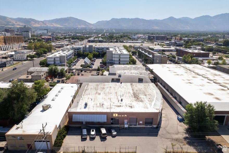 This 1.88-acre, (that includes two parcels, tax ID#s 15-12-176-002 and 15-12-176-001) L-shaped development site with frontage on both 800 South and 500 West is positioned in the heart of Salt Lake City's dynamic and rapidly transforming Granary District. Surrounded by a growing mix of residential, creative, and commercial uses, the site offers a rare opportunity for impactful infill development in one of the city's most active redevelopment corridors.  Zoned CG (General Commercial), the property supports a wide range of uses-including high-density multifamily, retail, office, and mixed-use development. The base zoning allows for buildings up to 75 feet, with the potential to reach 105 feet through design review, making it ideal for vertical urban development.  Located within the Granary District Area Plan, the site is set to benefit from significant public investment in multimodal infrastructure: upgraded sidewalks, protected bike lanes, improved intersections, and enhanced TRAX light rail access, including proximity to the 900 South station and potential new stops in the district. These improvements are designed to encourage walkability, reduce vehicle reliance, and support Salt Lake City's smart growth and sustainability goals.  With strong market fundamentals, ongoing redevelopment momentum-including major nearby projects-and Salt Lake City's pro-growth climate, this site represents a compelling opportunity for developers or users seeking scale, flexibility, and visibility in a premier downtown location.  Square footage figures are provided as a courtesy estimate only and were obtained from Salt Lake County Records.  Buyer is advised to obtain an independent measurement.