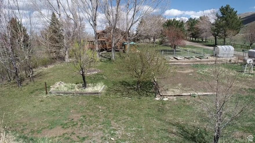 Tucked beneath the majestic "Hole in the Mountain Peak" in the Ruby Mountains, Lucky Starr Ranch is one of Nevada's most picturesque properties-ideal for a future Dude Ranch. Spanning 72.63 acres with historic water rights from the 1870s, this property offers commercial easements for unaccompanied guest access to roads and trails. The spacious 4,589 sq ft main home features 6 bedrooms, 3.5 baths, a sauna, oversized 3-car garage, fruit orchard, and serene meadow. A newer barn includes a well-appointed bunkhouse with kitchen, laundry, and full bath. Rare opportunity, unmatched setting & so much more. Schedule your private showing today. ***Professional Photography coming soon!***