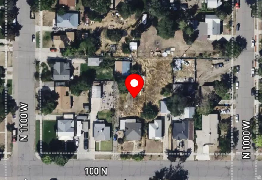 This is a flag lot behind the home at 1050 W 100 N Provo, UT 84601.  The Tax ID # listed, and the est taxes, refer to the home in the front. A new tax ID number for the flag lot will be issued in a couple weeks. Utility bond is required as part of the sale, to be completed at the time of closing.