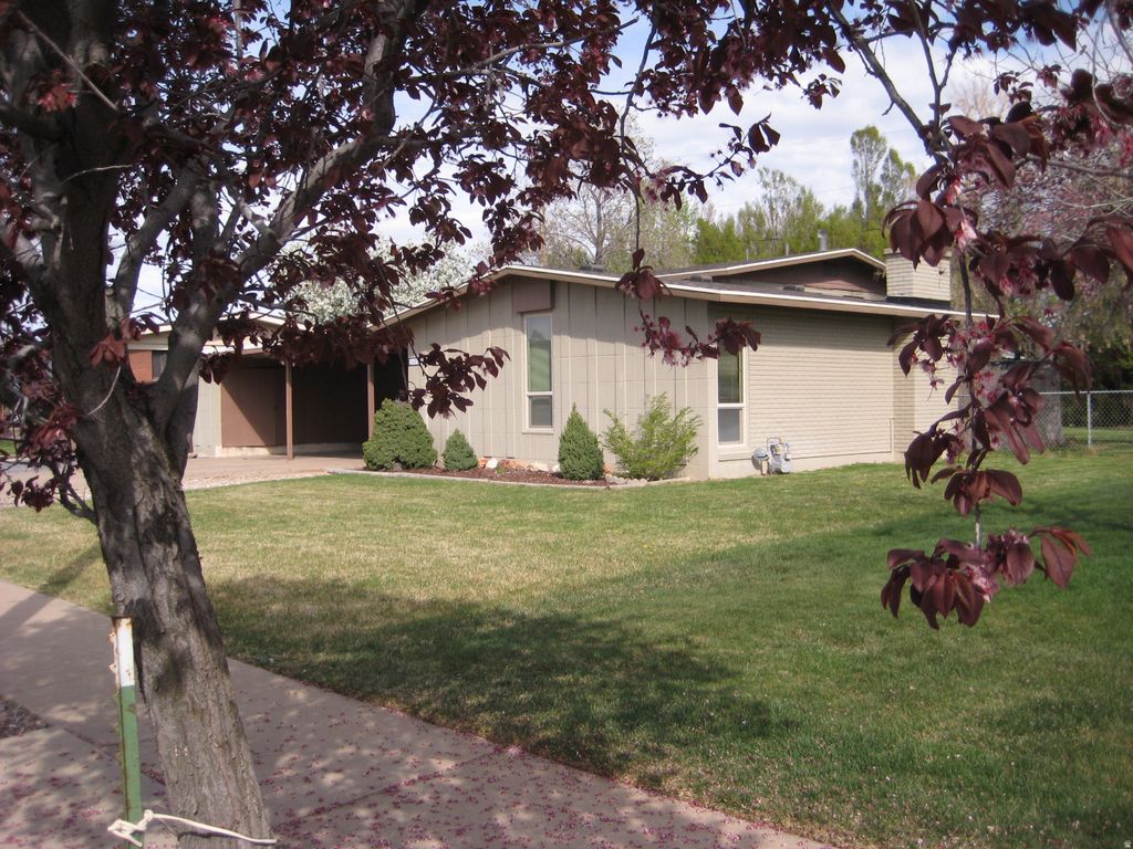 Photo of 2402 W 5075 S, Roy, UT 84067 (MLS # 2146973)