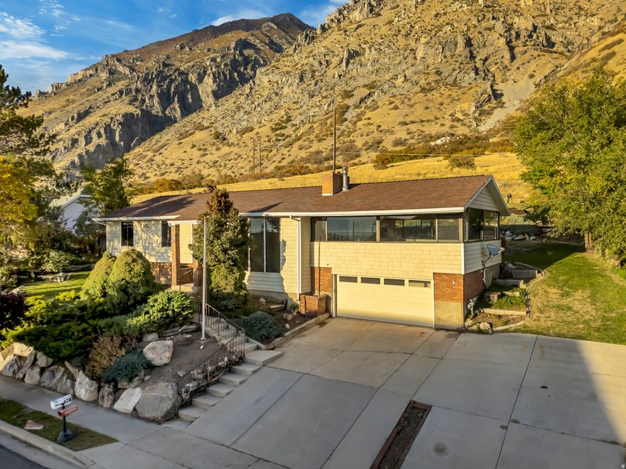 Backyard Mountains: Beautiful foothills split-level on a rare 0.35-acre lot with no rear neighbors, open space & unobstructed mountain views. Spectacular scenery from every window. A spacious family/bonus room sits above the 2-car garage - perfect for gatherings, entertainment, or play. Updated with new paint, carpet & flooring plus a newly epoxied garage floor. Move-in ready and perfect for buyers seeking privacy, peace & nature near Springville amenities.  Homes in this area rarely come on the market!   ---Agent related to the Seller---  Home Warranty Included *No seller finance*    All info is deemed reliable, but not guaranteed. Buyer is responsible for verifying all listing information, including square feet/acreage, to the buyer's own satisfaction.