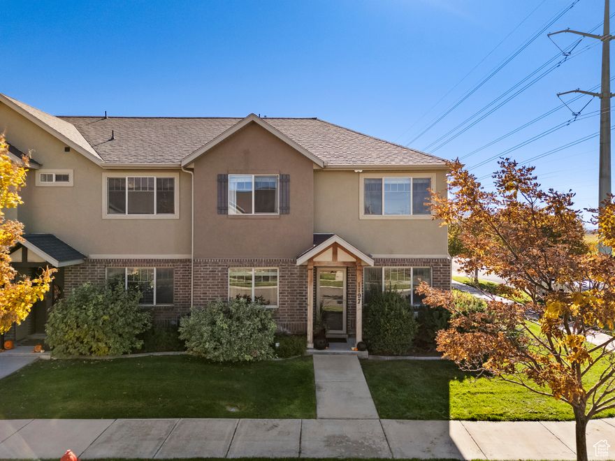 Welcome home to this beautiful turnkey! Located in a quiet, secluded neighborhood-the perfect blend of peace, comfort, and convenience! Enjoy breathtaking panoramic views right from your private patio, ideal for relaxing mornings or sunset evenings. This well-maintained end unit features updated kitchen counters, plenty of parking, and an inviting open layout that flows effortlessly throughout. The fantastic primary suite offers comfort and style with spacious closets and ample storage. You'll love the super affordable HOA, giving you all the perks of community living without the high costs. Just minutes from local markets, gyms, and favorite hot spots, plus easy access to I-15, this home makes commuting and daily errands a breeze. If you've been searching for a move-in-ready home with amazing views, a quiet setting, and unbeatable convenience, this is THE ONE!