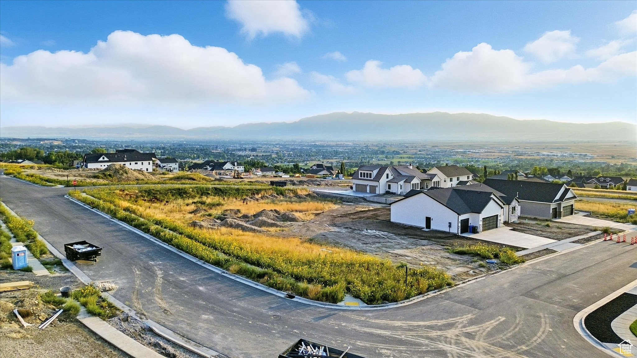 This .29-acre East Bench lot #17 offers some of the valley's most breathtaking views and the perfect setting for your dream home. With an ideal size for flexible design, the property allows for the potential of a walkout basement and minimal excavation, streamlining your build process. Seize the opportunity to create a custom retreat in Hyde Park's most desirable new community-welcome home to Cedar Bluffs.