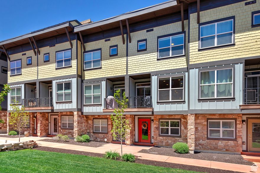 Available to Nightly Rent & Fully Turn-Key/Live & Walk to Everything! Come discover this bright and meticulous 2-bedroom/3-bathroom townhome, offered fully TURN-KEY and move-in ready! Ideally suited for everyone--full time residents, second home buyers or investors, this Nevis townhome is located in the vibrant Newpark Town Center, which allows NIGHTLY RENTALS and features a unique pedestrian experience, as well as FREE bus service to take you all over town! Enjoy the best of urban living with a private rooftop deck that features breathtaking views of Swaner Nature Preserve, the Olympic Park, and the Park City ski runs. The deck is equipped with a storage closet, gas stub for grilling or firepit, and ample space for outdoor furniture. Inside, the open floor plan is light and bright, featuring a gourmet kitchen with quartz countertops and a gas range. Upgrades throughout include laminate floors, alder wood doors, LED lighting, and custom insulating blinds. The family room is complemented by a cozy gas fireplace, and flows out to a balcony with a gas line for grilling. Both bedrooms offer privacy and functionality with ensuite bathrooms and designer lighting. The home is designed with eco-friendly features such as 1.5 KW solar panels for great savings on your energy bills, energy-saving appliances and a tankless water heater. The oversized one-car garage, with an owner lockout, provides secure storage or rental flexibility. Located just steps away from shopping, dining, and entertainment, you will enjoy walkable accessibility to: Smith's, restaurants, coffee shops, a movie theatre, retail shops, Barnes & Noble, Petco, the post office, U of U clinic & pharmacy, a liquor store, and the Basin Fieldhouse, to highlight just a few. Recreation and accessibility are key highlights, with the FREE bus system to take you to Deer Valley, Canyons Village, Park City ski resorts & Historic Main Street, which are all within a 10-15 minute car ride, as well as the SL International Airport, which is only 25 minutes away.