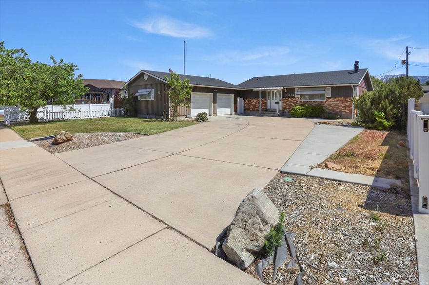 ***OPEN HOUSE Saturday May 2nd from 12PM - 2PM*** Rambler in a convenient Roy location with thoughtful updates throughout. Updated kitchen and comfortable living areas make it easy to settle right in. Major improvements include a BRAND NEW ROOF, Lennox furnace, A/C, and heat pump installed in 2024 for year-round efficiency and peace of mind. Oversized 2-car garage, additional sheds for storage, and a spacious .23-acre lot with RV parking, just imagine the entertaining, or future possibilities. The walkout basement and covered patio add to the home's versatility and appeal. Basement has its own entrance so could easily be set for a studio mother in law apartment or separate ADU. Kitchenette area already in place as well as plumbing for private studio. Ideally located near shopping, schools, Hill Air Force Base (HAFB), and quick access to I-15, this home offers both comfort and convenience.