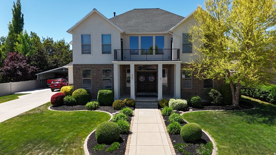 Stunning brick executive home that checks every box! From the soaring grand foyer to the rich solid walnut floors, quality and craftsmanship are evident throughout. With seven oversized bedrooms, FIVE gas fireplaces, a gorgeous home office, and formal dining, this home is built for both elegant entertaining and comfortable everyday living. The resort-style backyard features a full pickle ball court and basketball standard, while two decks - including one off the primary suite - offer the perfect spots to relax. Wake up to breathtaking east-facing mountain views every morning. Fresh carpet, new paint, a 3-year-old roof, and immaculate condition make this one truly move-in ready. Add in a 3-car carport, shed, and stunning professional landscaping and you have an unmatched offering. Homes like this don't come along often - schedule your showing today!