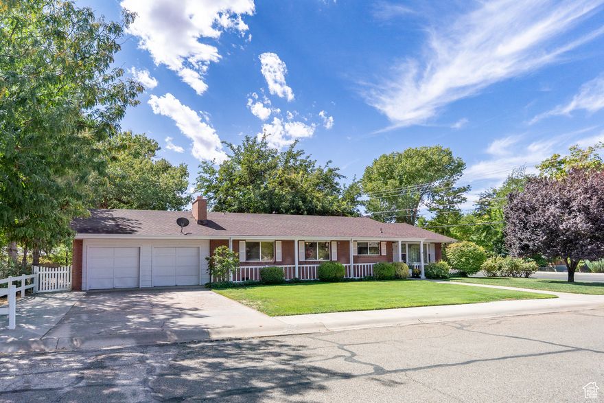 Don't miss out on this one-of-a-kind, one-level living home! This unique property features 4 bedrooms, 3 bathrooms, and one bonus room that would make a great craft room, exercise room, or extra bedroom. The interior is filled with natural light throughout and features an open-concept kitchen, dining, and living area with a cozy fireplace surrounded by a stunning stone wall. In the back of the home, there is an additional spacious family room with large windows and ample shelving for decor and books. Step outside to the private backyard oasis, complete with a deck, garden, and a hot tub for relaxing. You'll also find a fire pit with outdoor seating and multiple fruit trees, including apple, nectarine, and plum. A mature tree is ready for a treehouse or tree swing, making this the perfect space for all ages. The garage is equipped with a ramp for easy accessibility and there's extra parking on the side of the house. This property is in a community reinvestment area and qualifies for a community reinvestment act mortgage loan (CRA). As little as 3% down. To prequalify for special financing, contact listing agent.