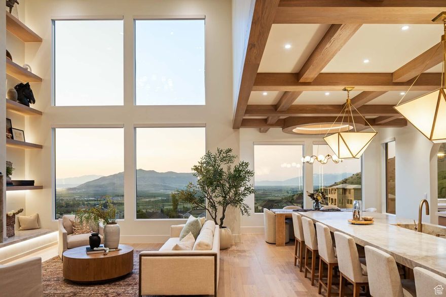 Make this beautiful house your home! Come see why this home was awarded the 2025 Judges' Choice. Breathtaking views, stunning finishes and attention to the details make this home a one a kind! French modern inspired style with radius beams, backlit beams, arched fridge/freezer doors, 14- foot island with Taj Mahal countertops and custom stone sink, smart-glass master bath windows create privacy with one click, and don't miss the hidden pantry...  Separate entrance and parking for possible future ADU apartment in unfinished space. Schedule a showing today! Information provided as a courtesy only, buyer to verify.